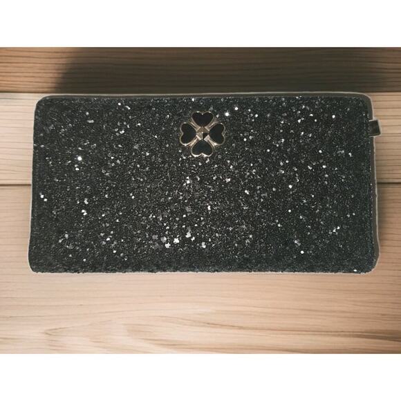 kate spade Handbags - NWOT Kate Spade Odette Glitter Large Slim Bifold Black 7x4